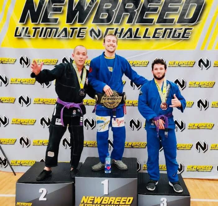 High-performance Brazilian Jiu-Jitsu competition at Absolute Jiu-Jitsu Academy.