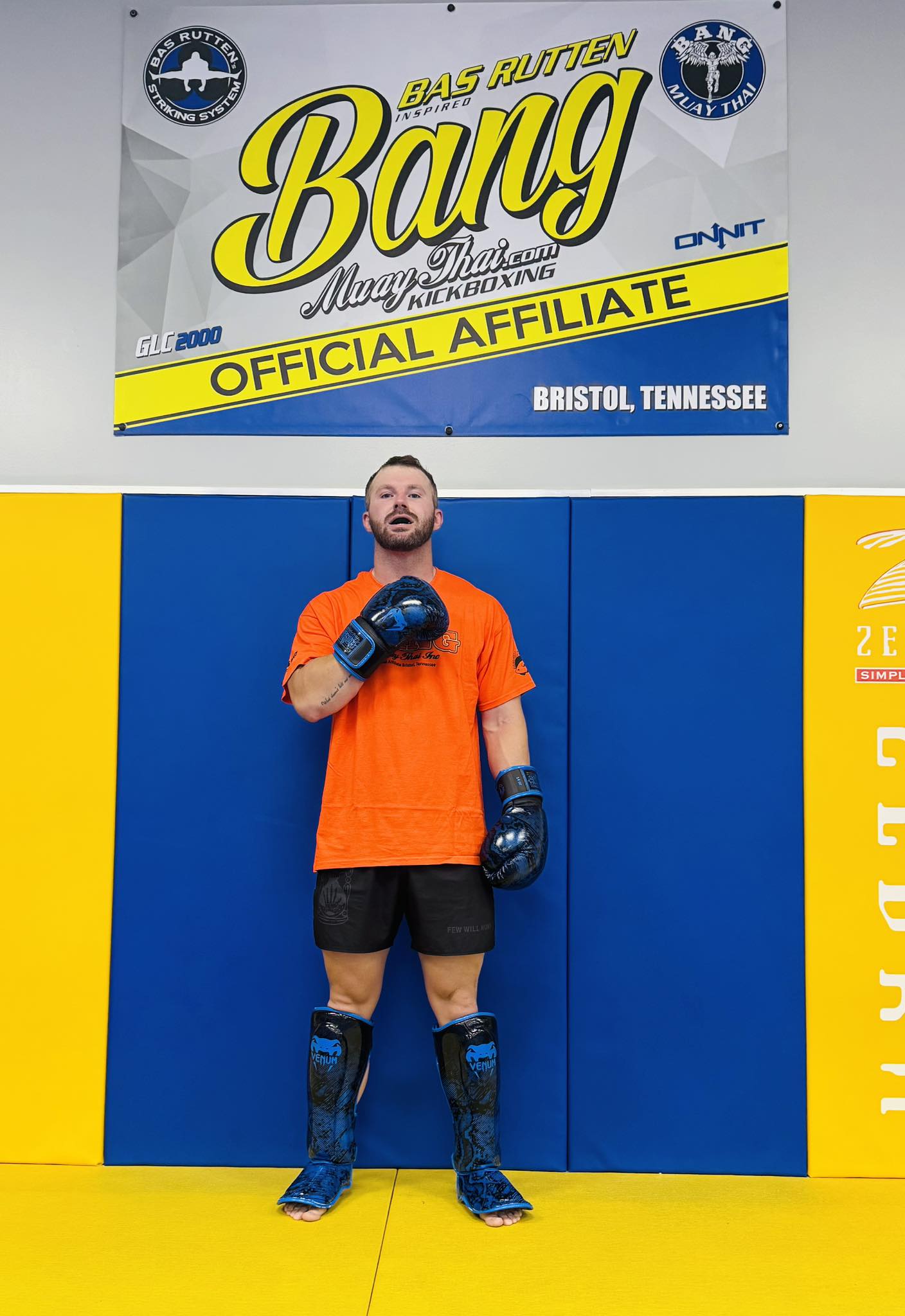 Image of male Brazilian Jiu-Jitsu athlete in grappling gear at Absolute Jiu-Jitsu Academy, highlighting martial arts training and BJJ competition.