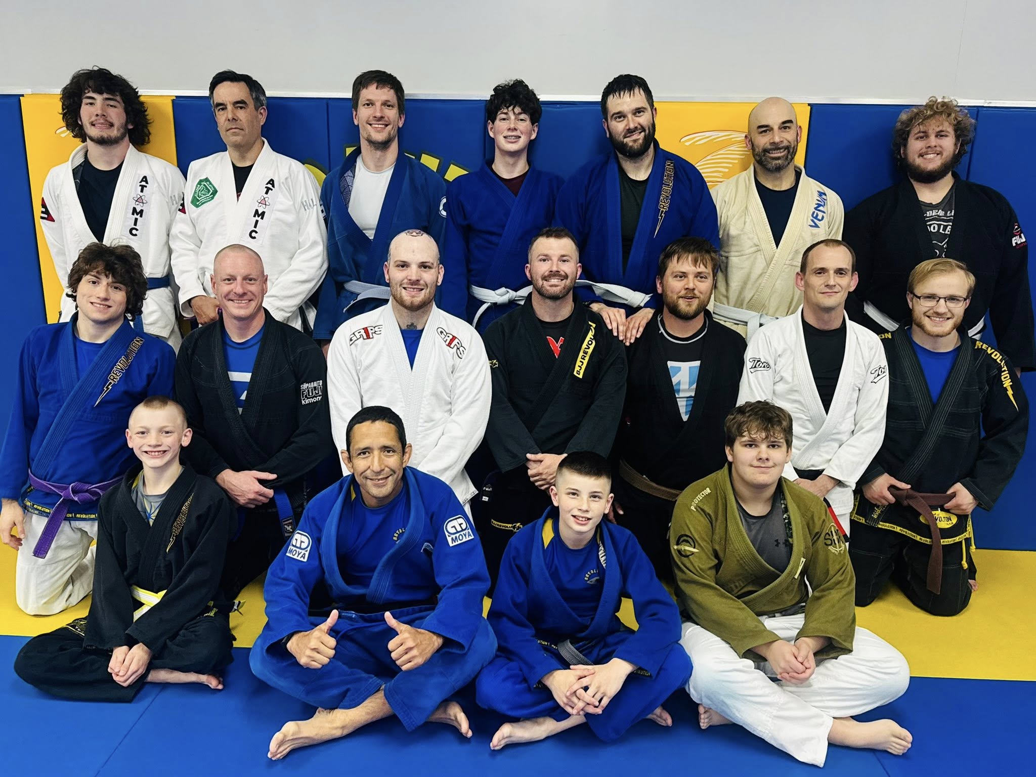Gustavo Carpio teaching Brazilian Jiu-Jitsu techniques during seminar at Absolute Jiu-Jitsu Academy.